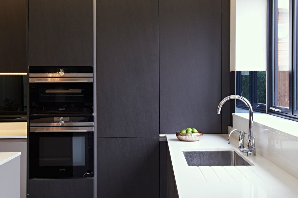 designer kitchens - arched tap