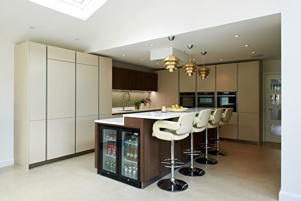 modern kitchen island with built-in fridge